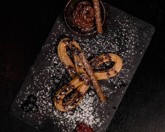 42. Churros con Nutella